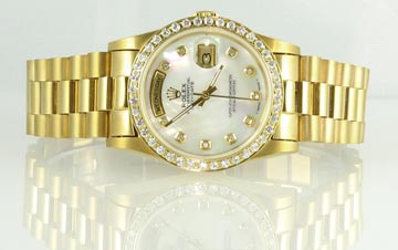 Rolex Watch on White Shiny Riser